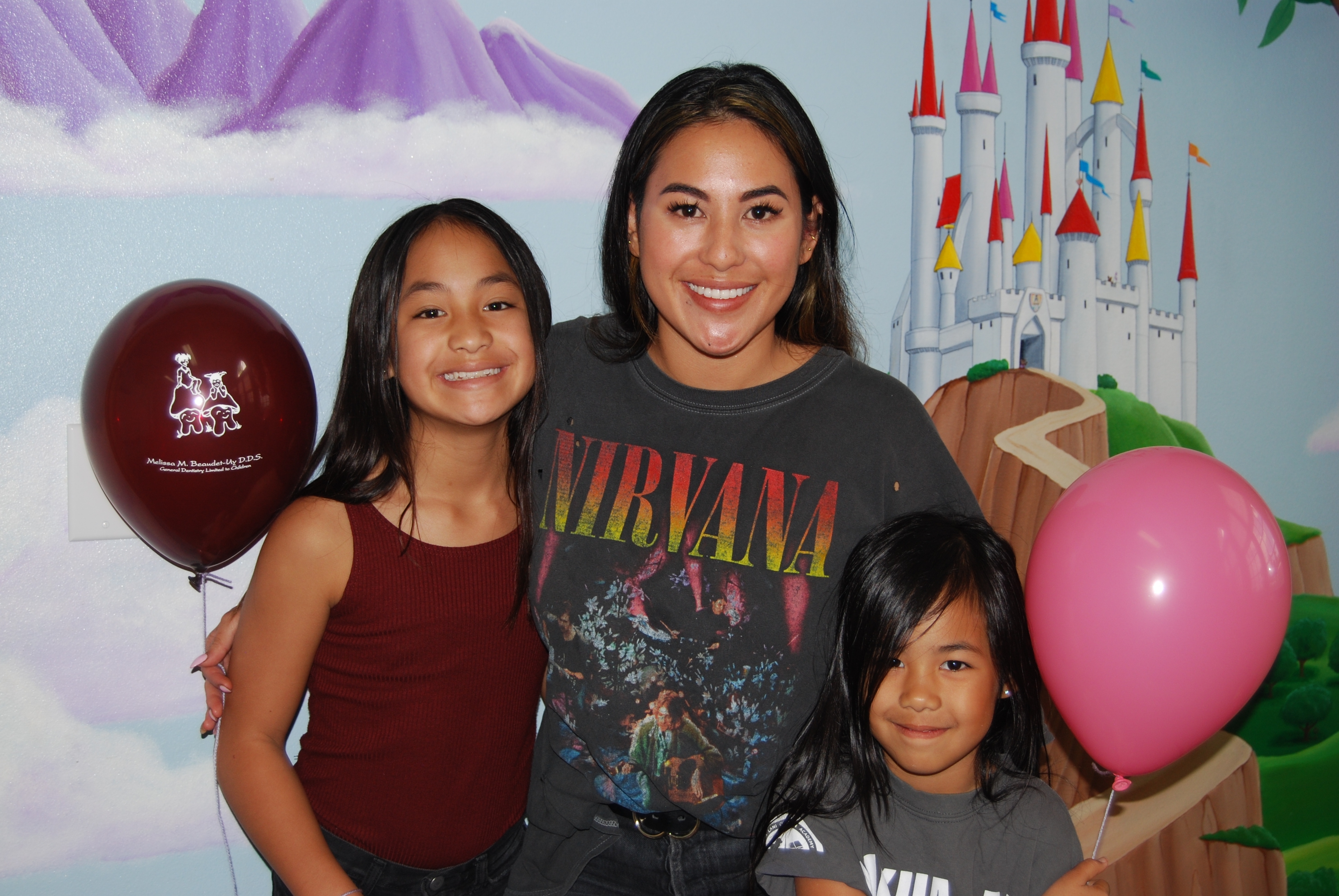 Family smiling together at Kona Kids Dentist
